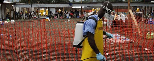 ebola-worker-spraying