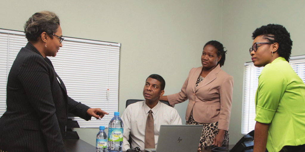  nayana williams | Lifespan spring water CEO and Co-founder talking with colleagues