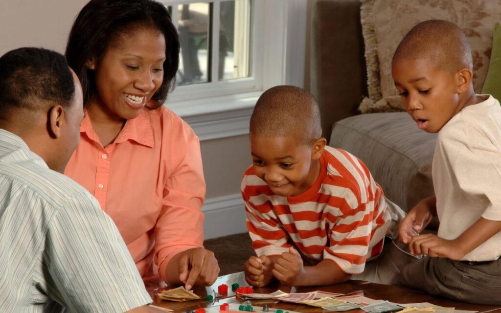 Family playing monopoly